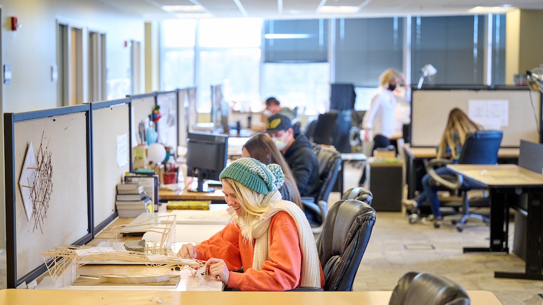 Students work in a studio in the Urban Design Center