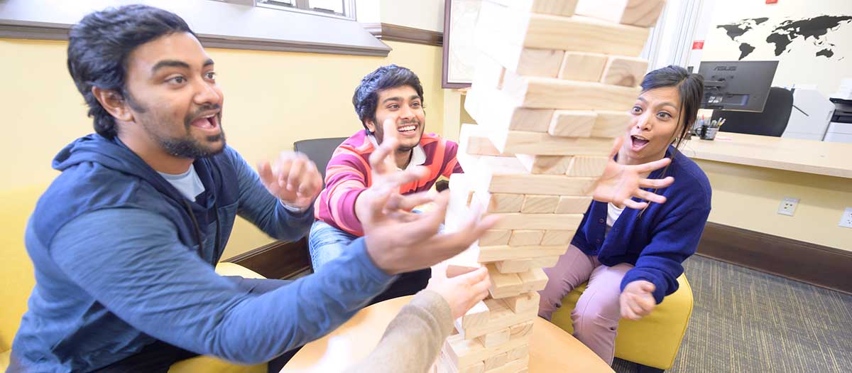 Students playing Jenga